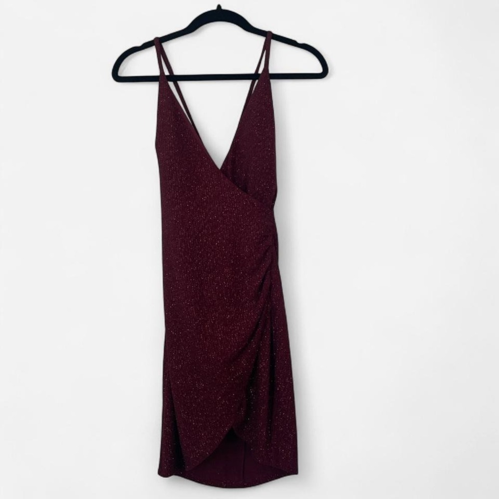 Speechless burgundy sparkly dress with a deep v neck and criss cross open back